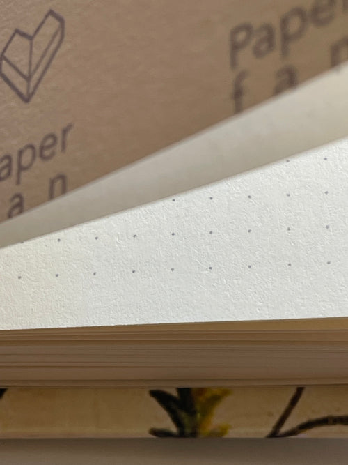 C-Museo “Pieces” - Libreta con arte en su portada.